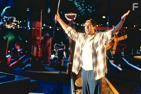 Happy works on his short game.