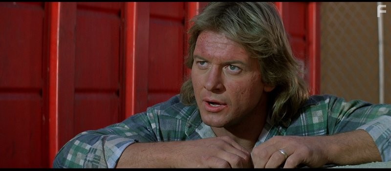 Roddy Piper in Чyжие среди нас (1988)