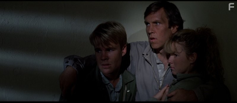 Jeb Stuart Adams, Wendy Brainard, and Jason Robards III in Чyжие среди нас (1988)