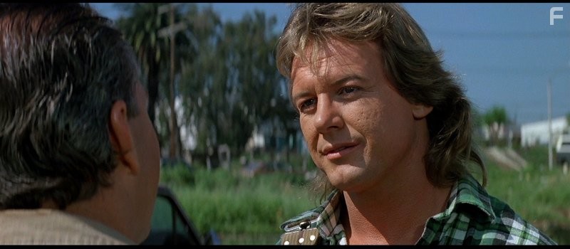 Roddy Piper in Чyжие среди нас (1988)