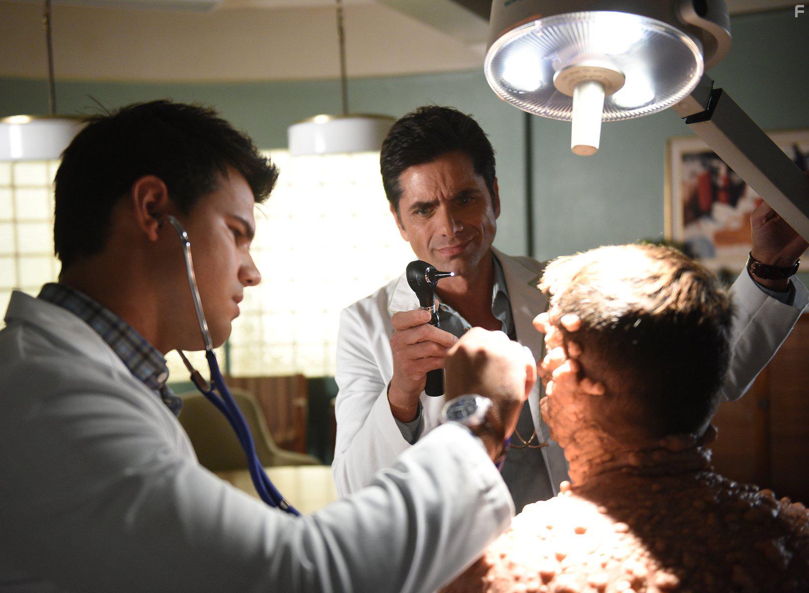 John Stamos, Taylor Lautner, and Colton Haynes in Scream Queens (2015)