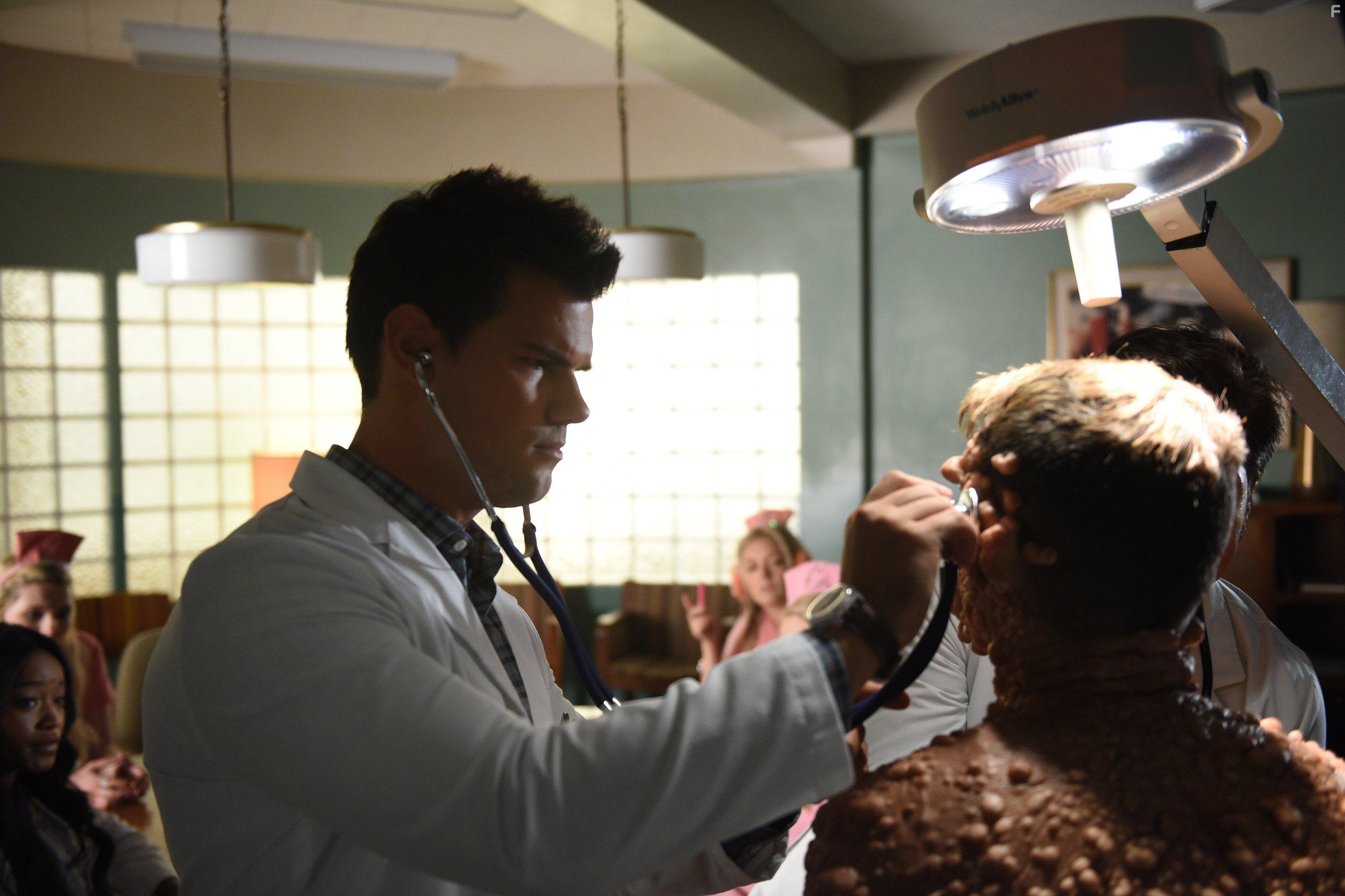 Taylor Lautner and Colton Haynes in Scream Queens (2015)