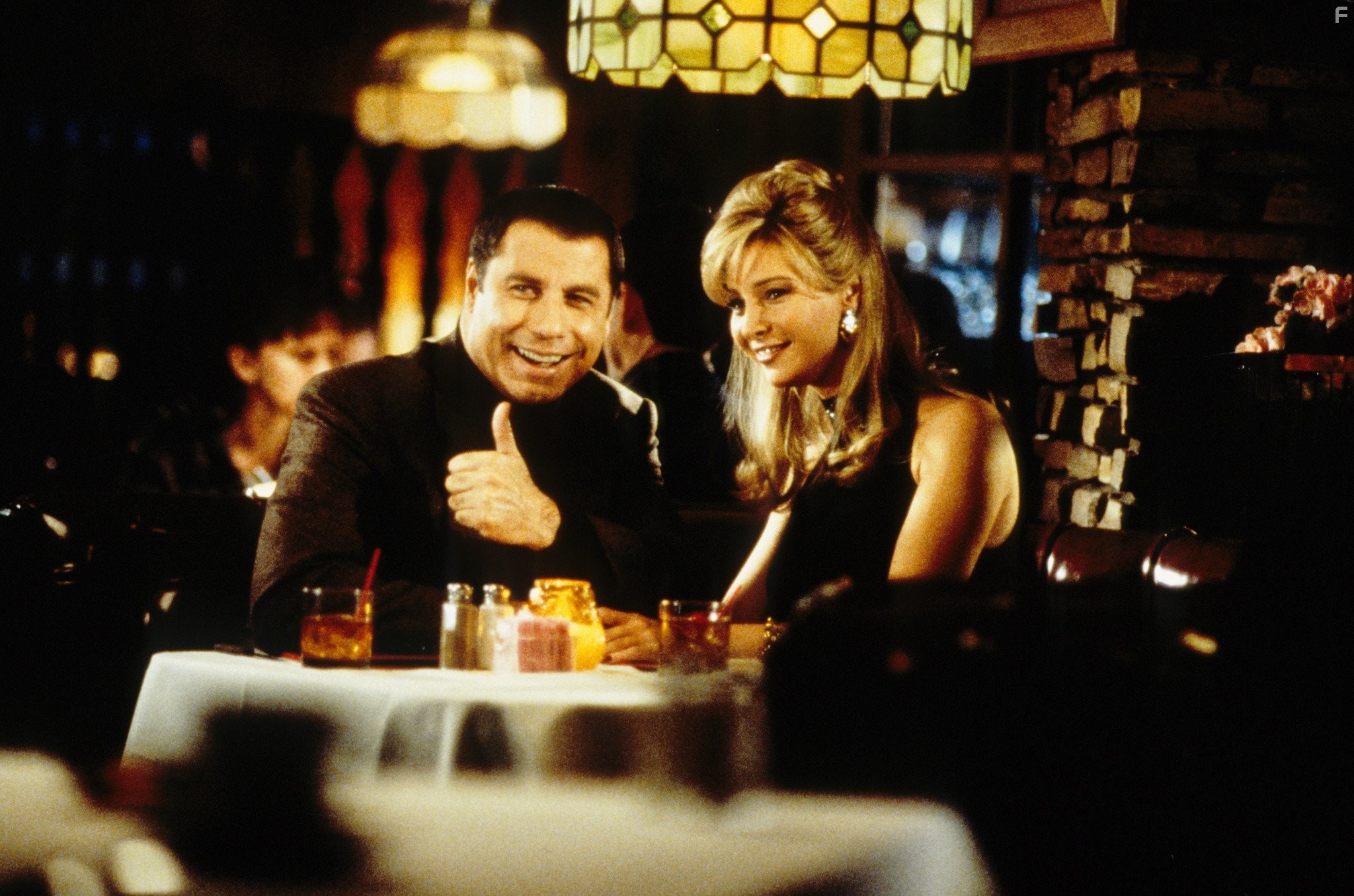 John Travolta and Lisa Kudrow in Счастливые номера (2000)