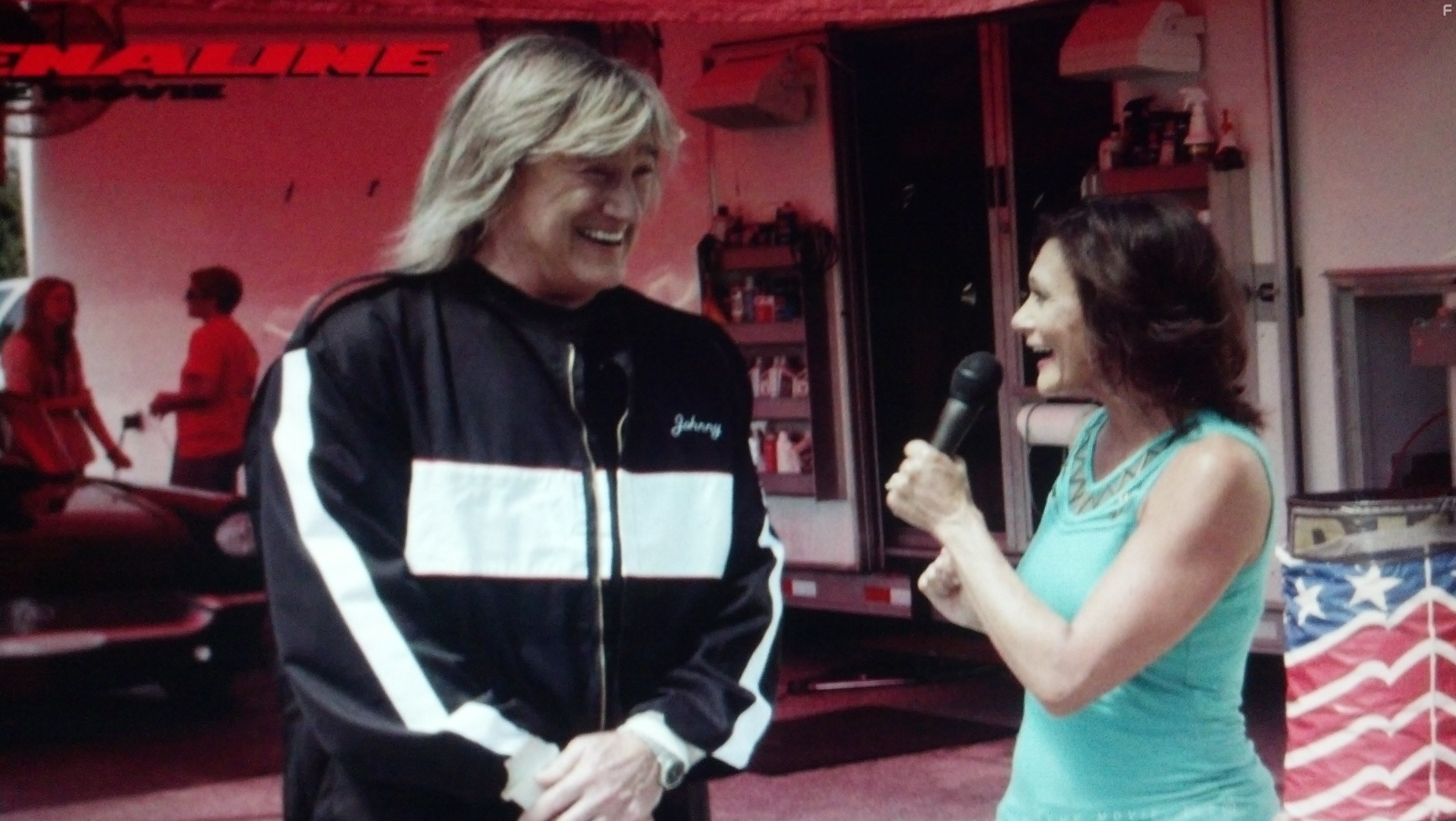 Irene Santiago and John Schlitt in Adrenaline (2015)