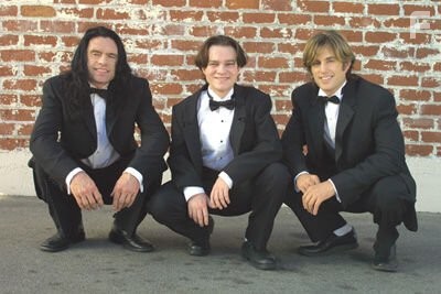 Greg Sestero, Philip Haldiman, and Tommy Wiseau in The Room (2003)