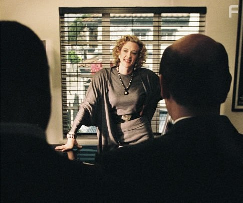 Savvy Hollywood agent Fanny Nash (Joan Cusack, center) instructs members of the FBI on the dos and dont's of striking a deal in Hollywood.