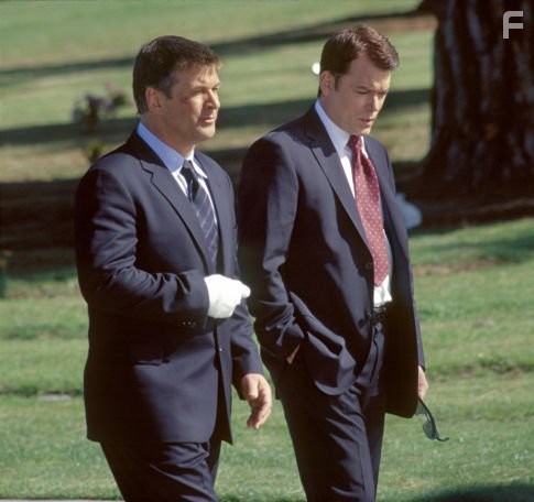 Joe (Alec Baldwin, left) confers with his brother, FBI cheif Jack Devine (Ray Liotta, right) on career options.