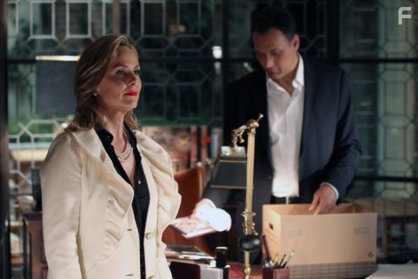 Jimmy Smits and Melora Hardin in Outlaw (2010)