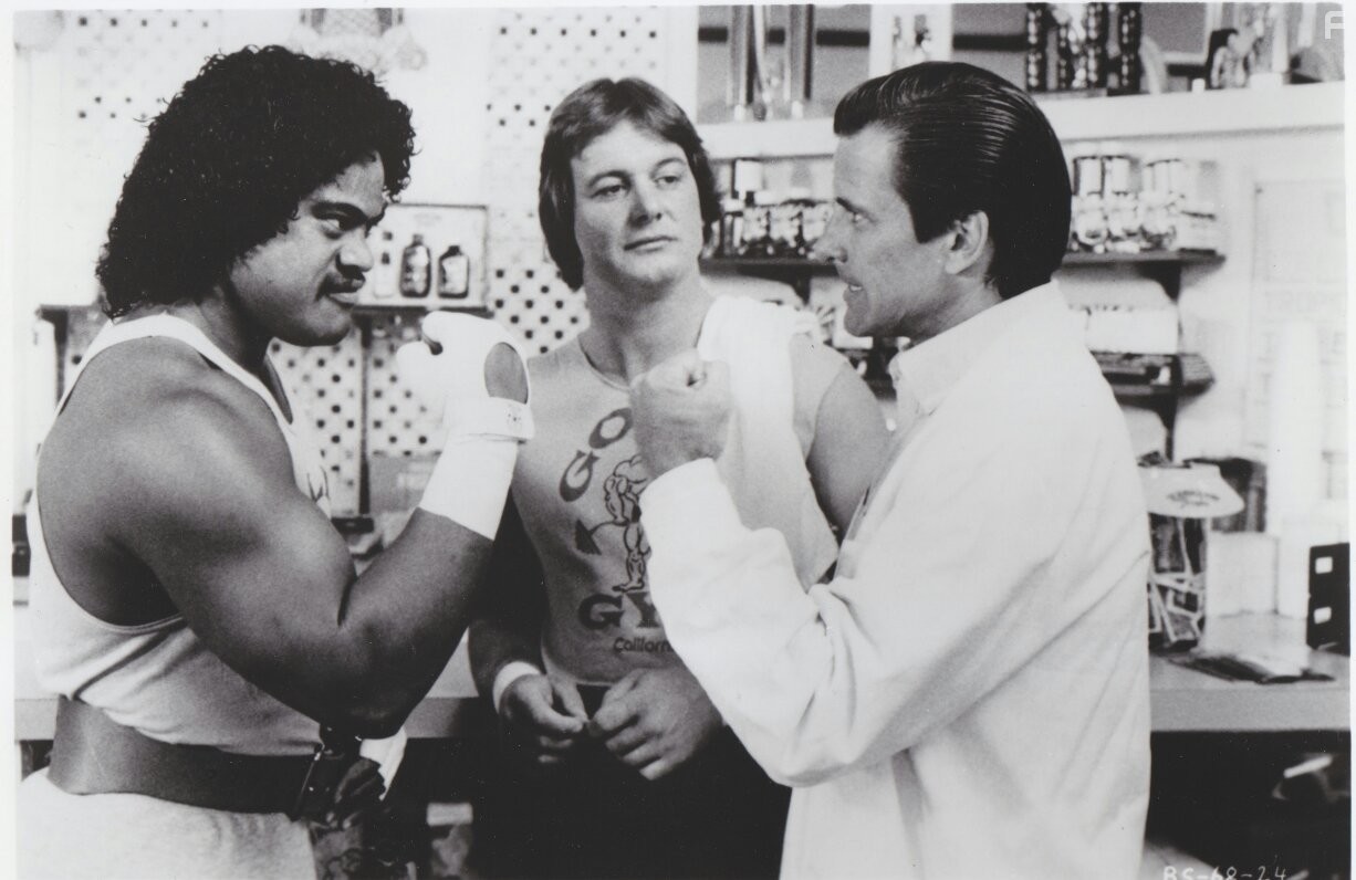Dirk Benedict, Sam Fatu, and Roddy Piper in Body Slam (1986)