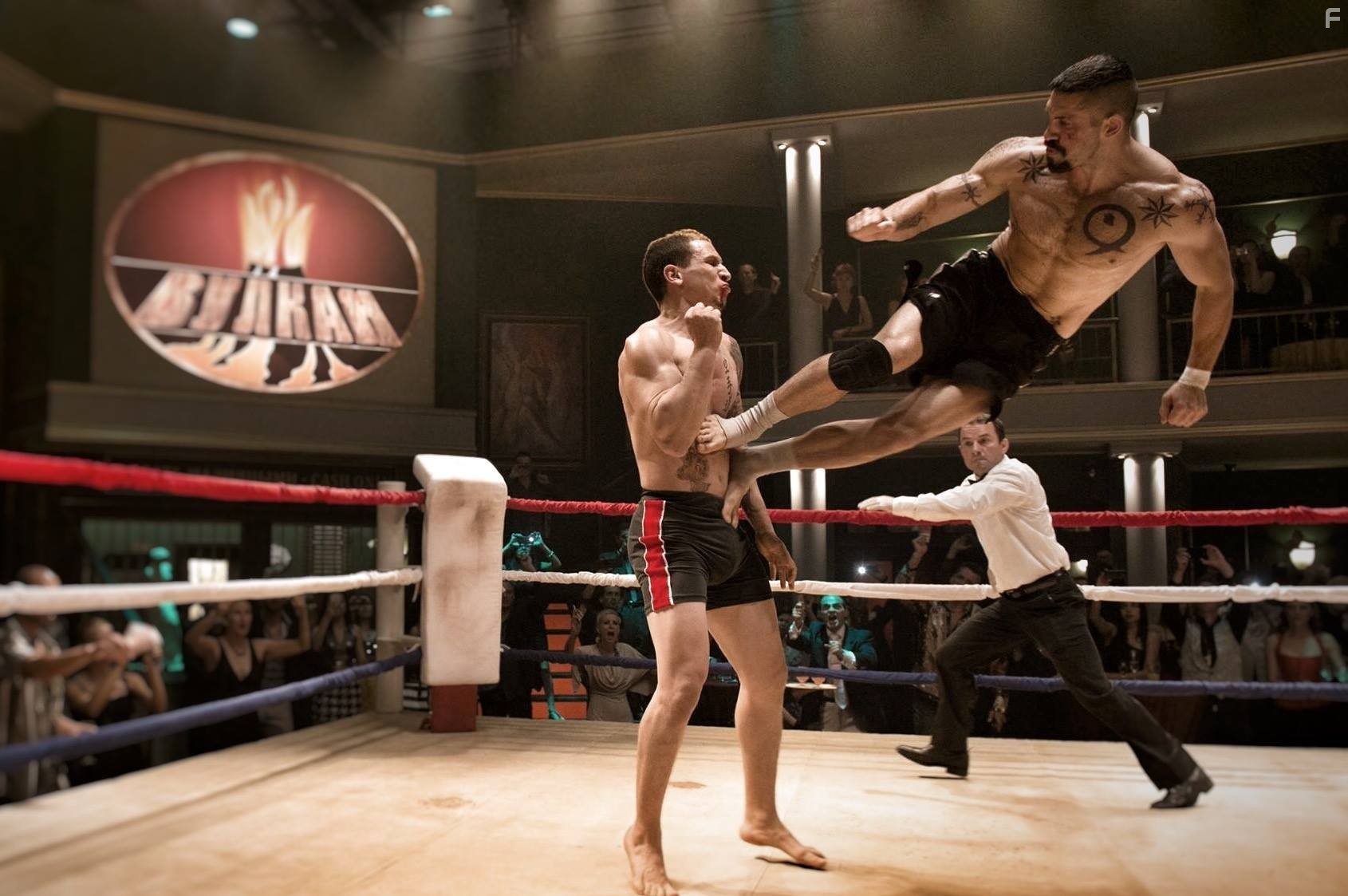 Scott Adkins and Brahim Achabbakhe in Бойка: Неоспоримый (2016)