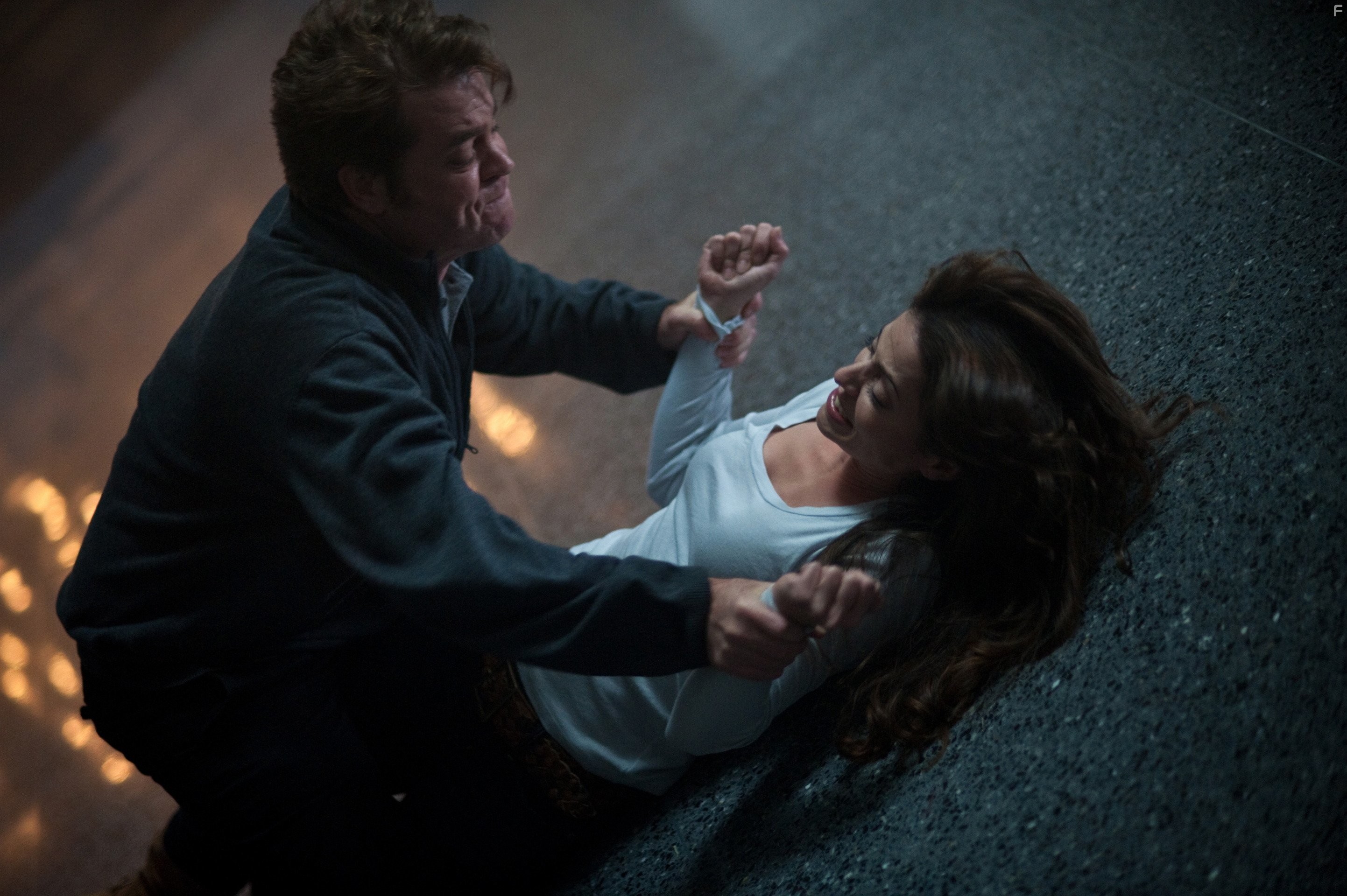 Emmanuelle Vaugier and Lawrence Turner in Зеркала 2 (2010)