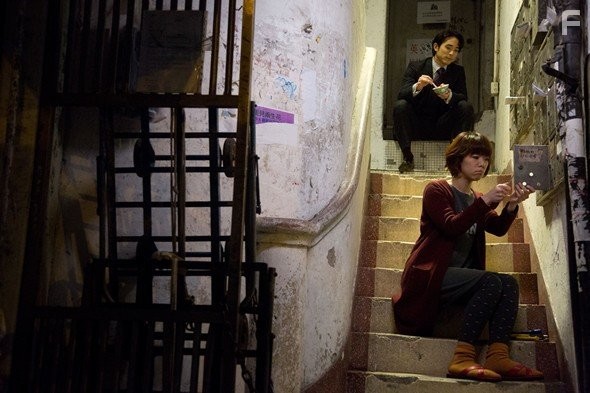 Alex Tak-Shun Lam and J. Arie in Get Outta Here (2015)