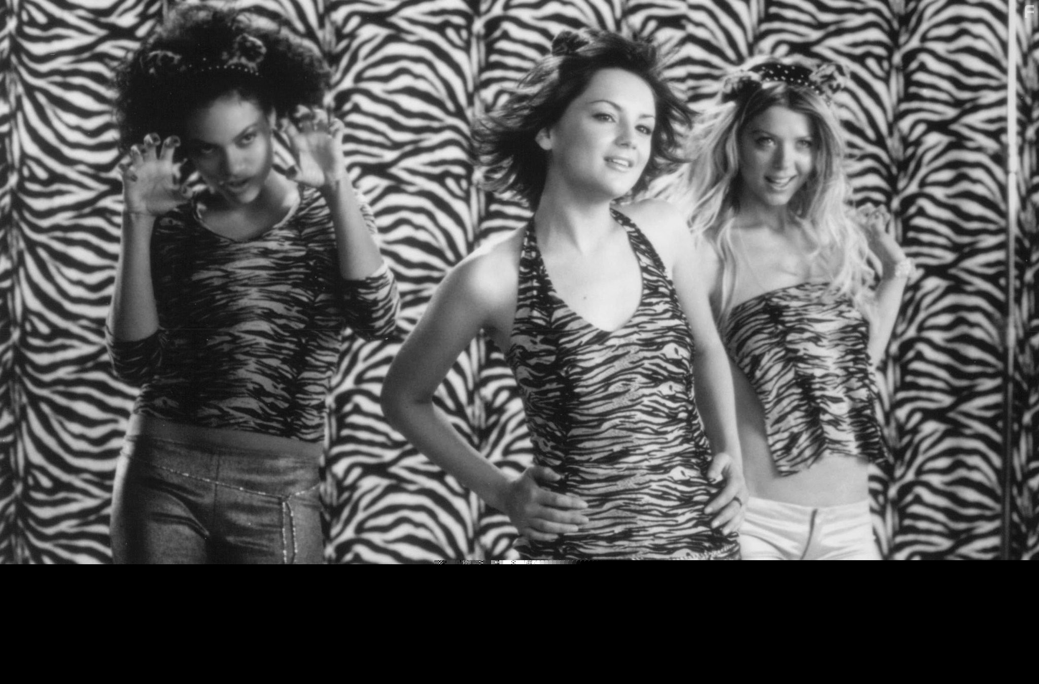 Rachael Leigh Cook, Tara Reid, and Rosario Dawson in Джози и кошечки (2001)