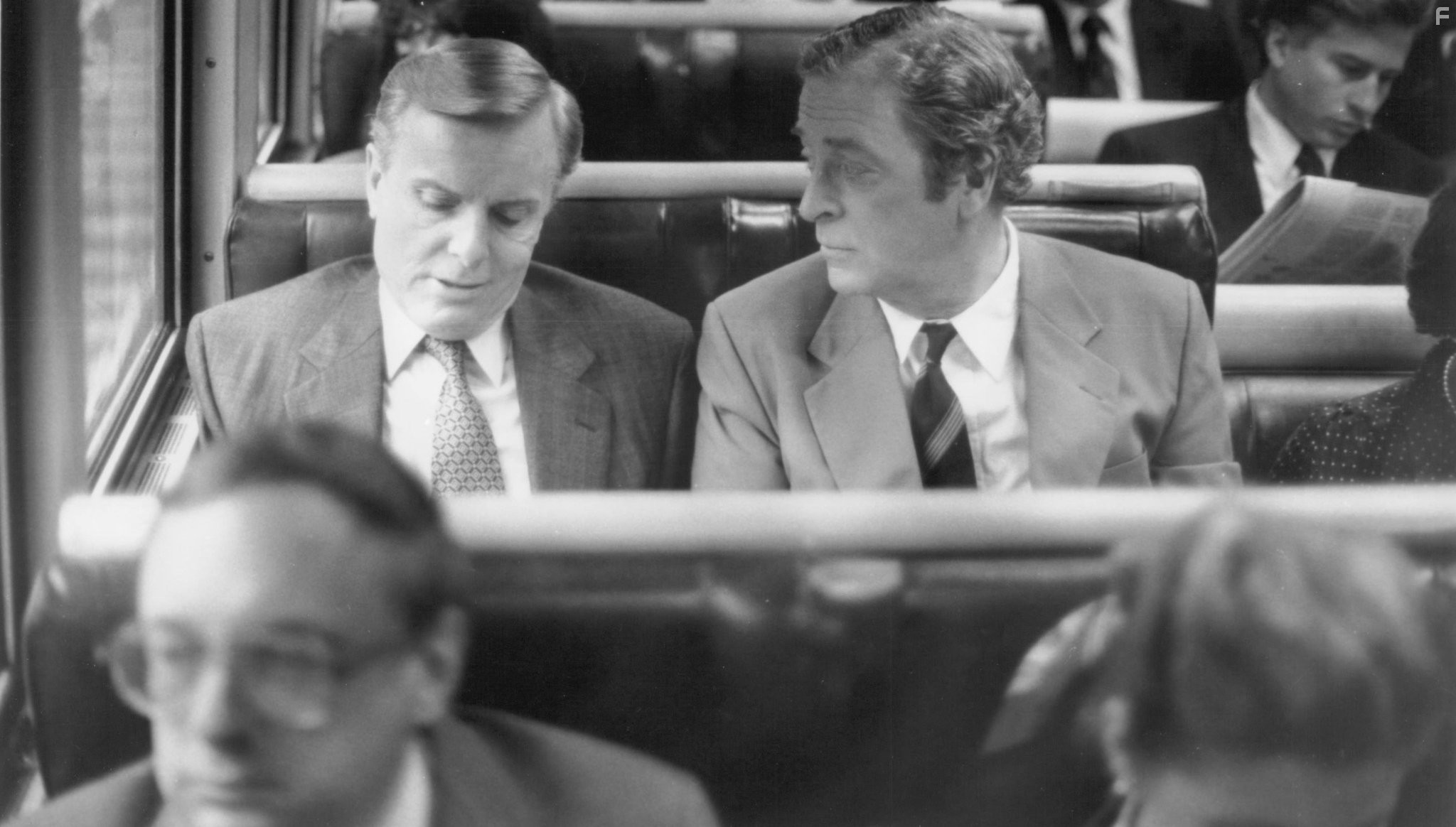 Michael Caine in Удар по системе (1990)