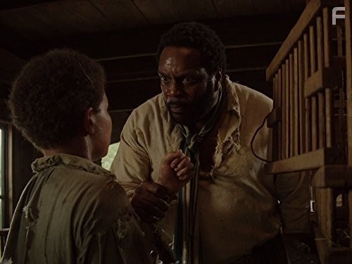 Chad L. Coleman and Jaylin Ogle in Корни (2016)