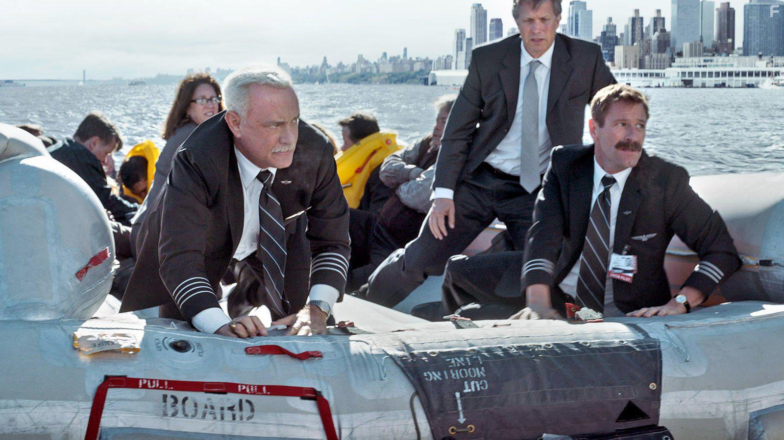 Tom Hanks, Aaron Eckhart, and Shane P. Allen in Sully (2016)