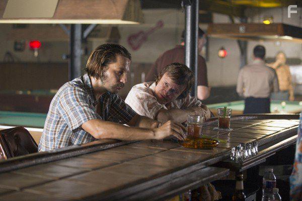 Damon Herriman and Logan Marshall-Green in Quarry (2016)