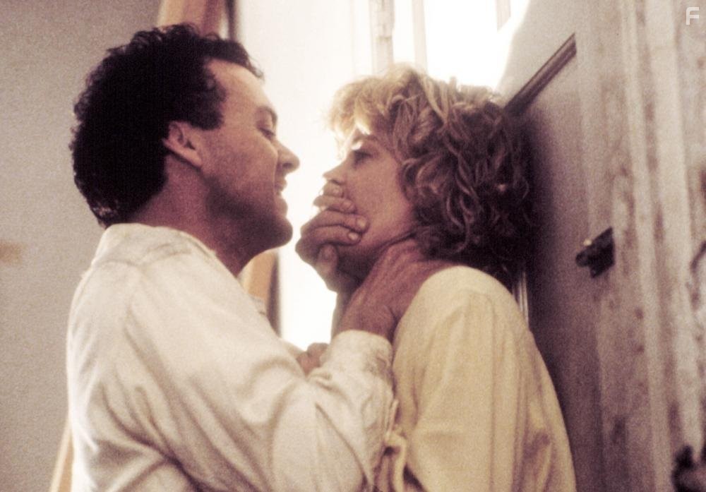 Melanie Griffith and Michael Keaton in Жилец (1990)