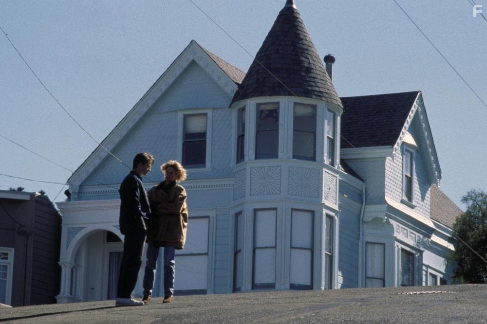 Melanie Griffith and Matthew Modine in Жилец (1990)