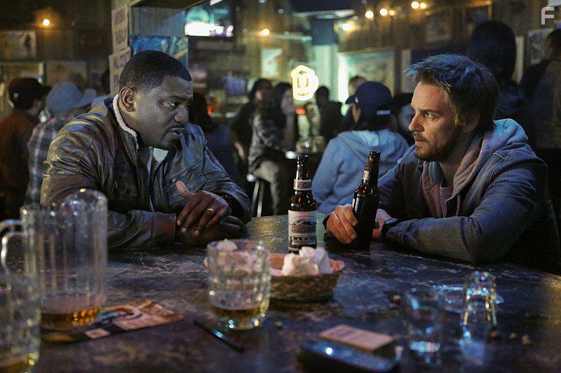 Mekhi Phifer and Riley Smith in Frequency (2016)