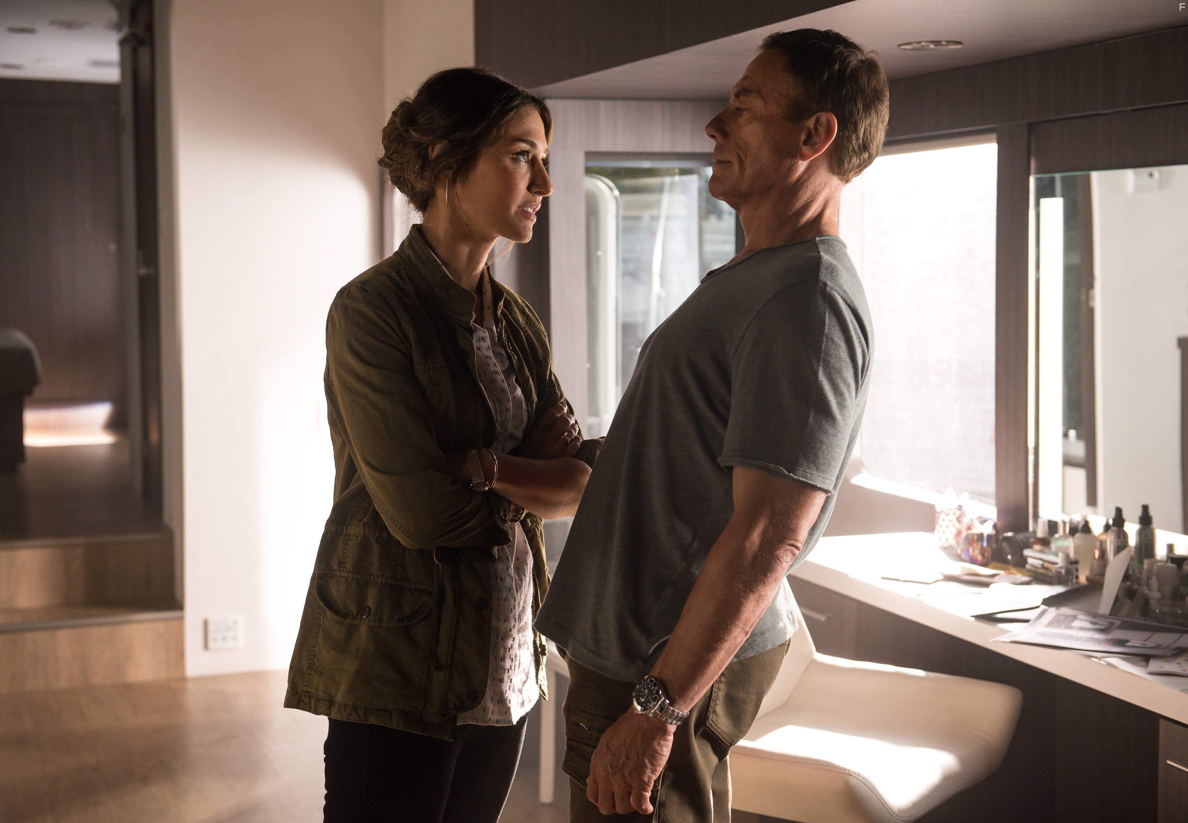 Jean-Claude Van Damme and Kat Foster in Pilot (2016)