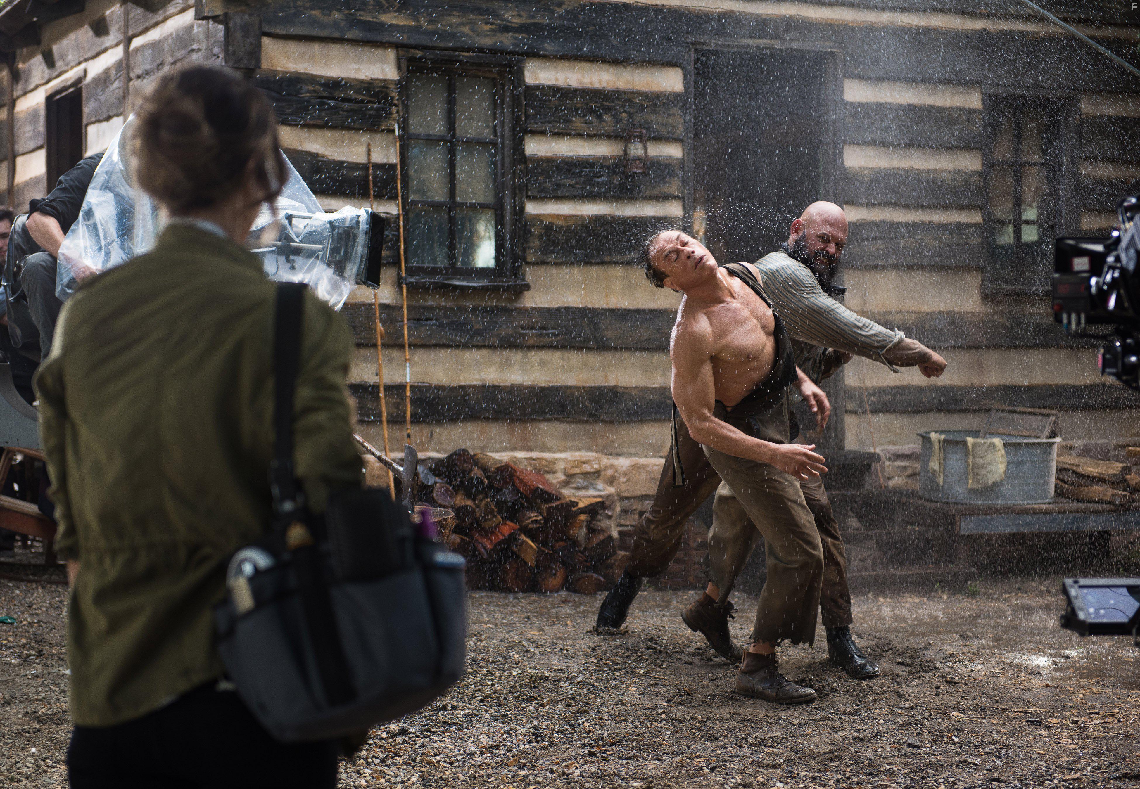 Jean-Claude Van Damme and Tait Fletcher in Pilot (2016)