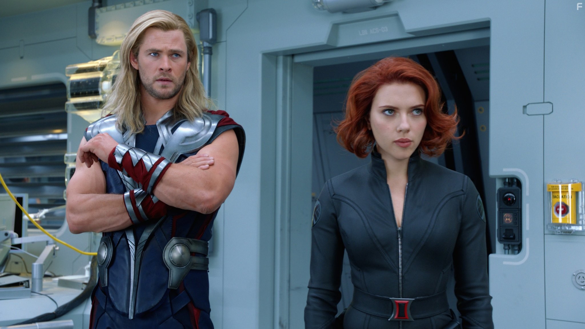 Scarlett Johansson and Chris Hemsworth in Мстители (2012)
