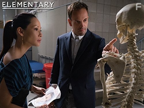 Jonny Lee Miller and Lucy Liu in Элементарно (2012)