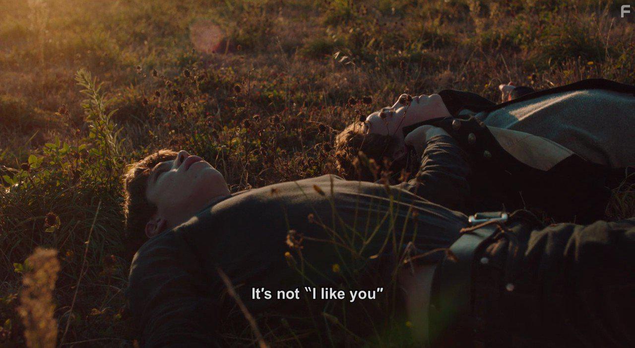 Phnix Brossard and Alex Lawther in Departure (2015)