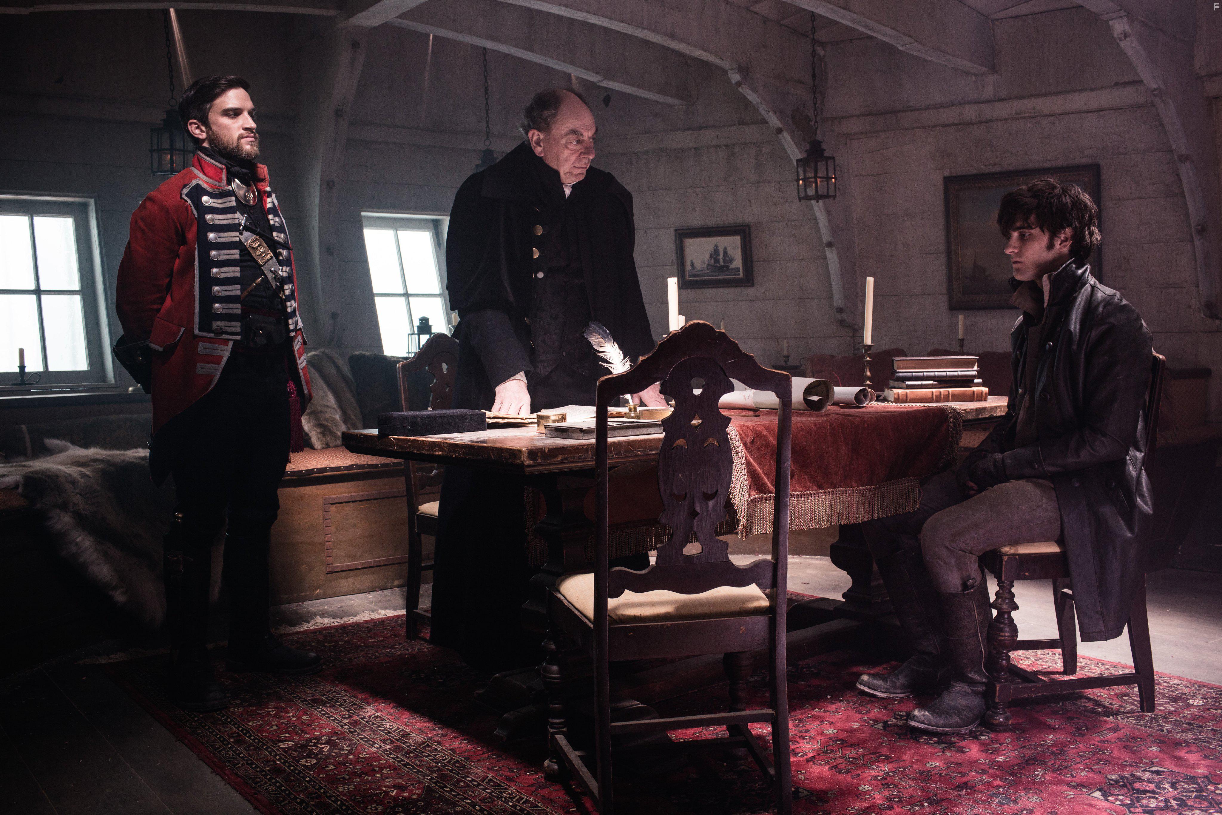 Alun Armstrong, Landon Liboiron, and Evan Jonigkeit in Frontier (2016)