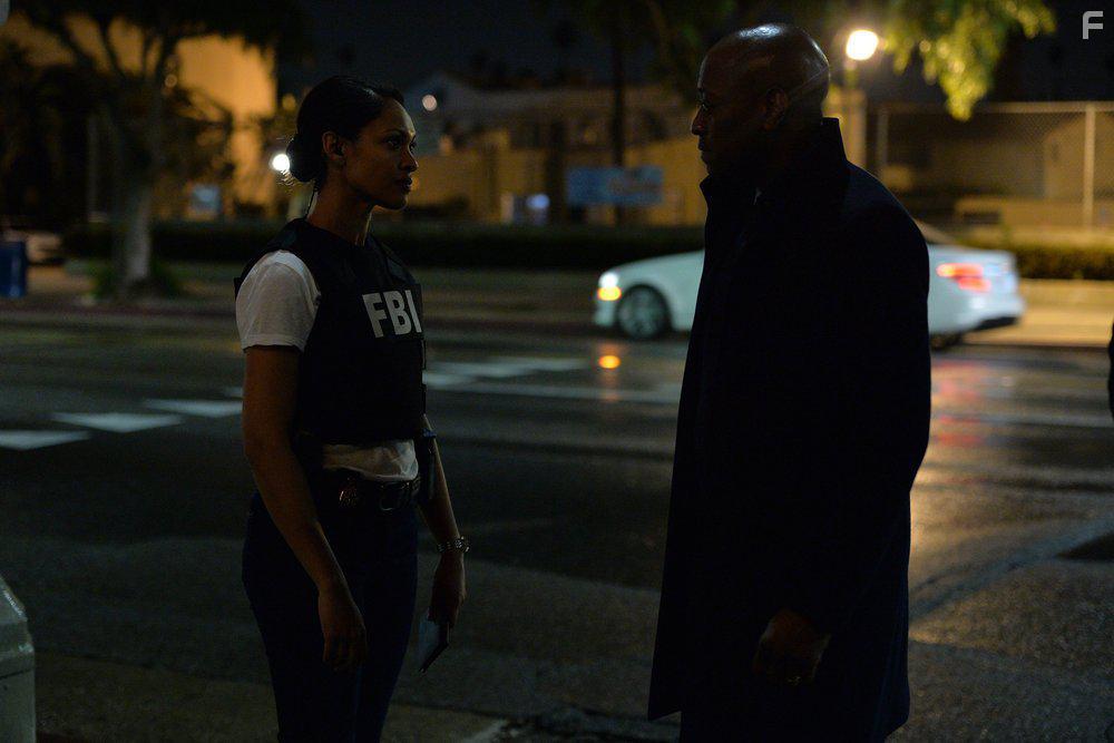 Omar Epps and Cynthia Addai-Robinson in Shooter (2016)