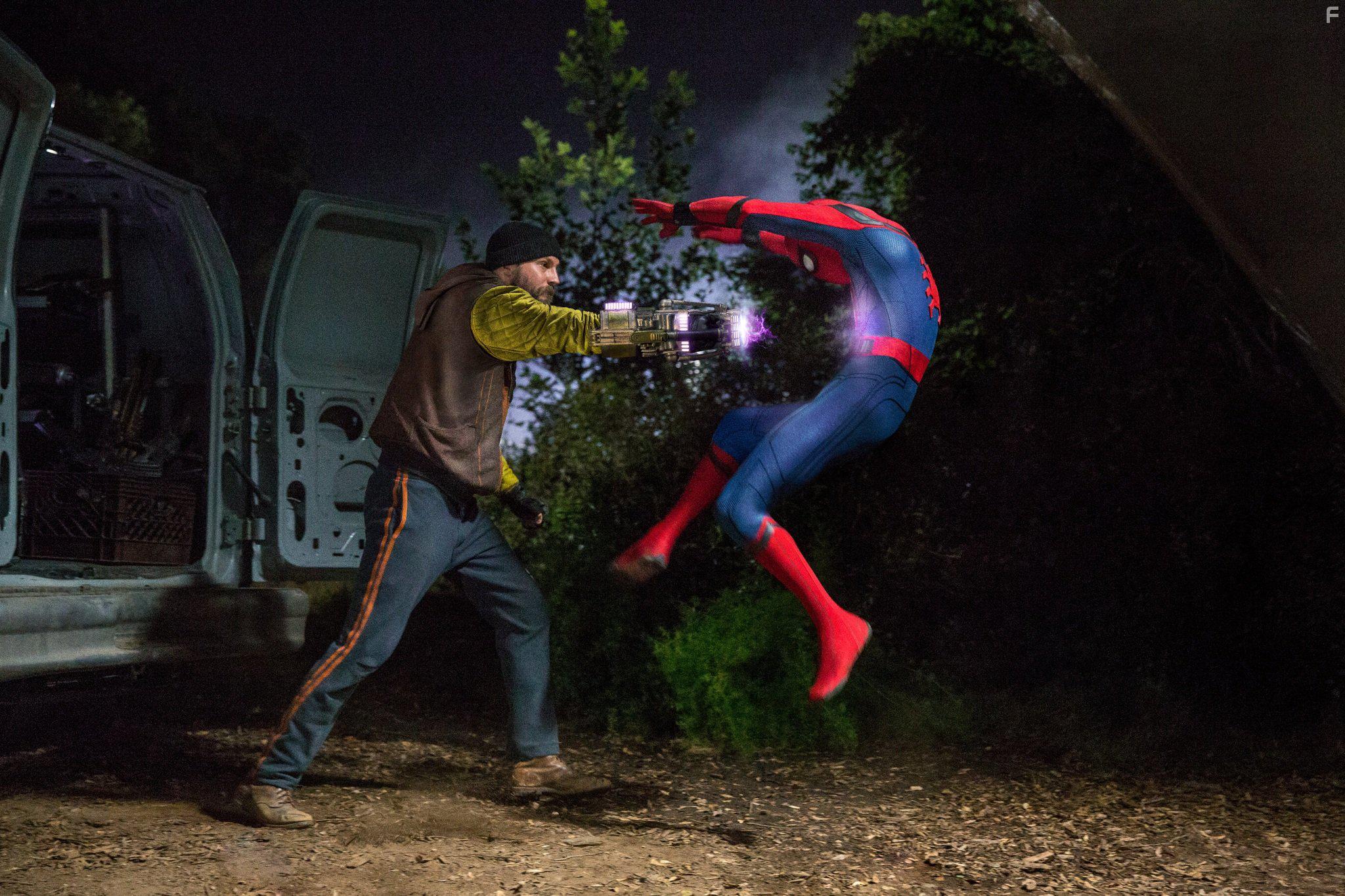 Logan Marshall-Green and Tom Holland in Spider-Man: Homecoming (2017)