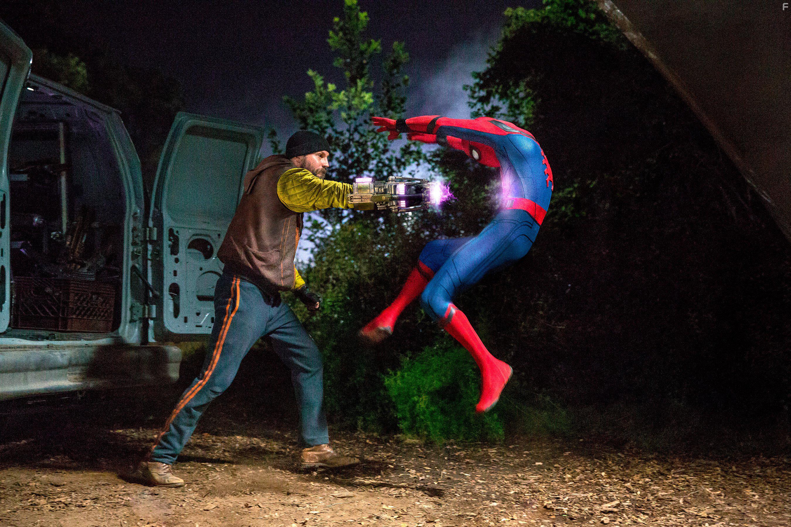 Logan Marshall-Green and Tom Holland in Spider-Man: Homecoming (2017)