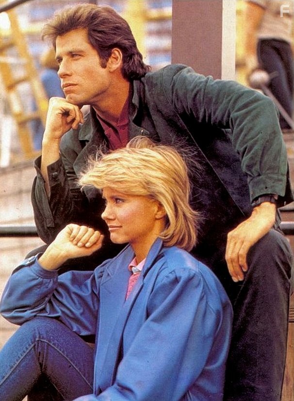John Travolta and Olivia Newton-John in Хорошая пара (1983)