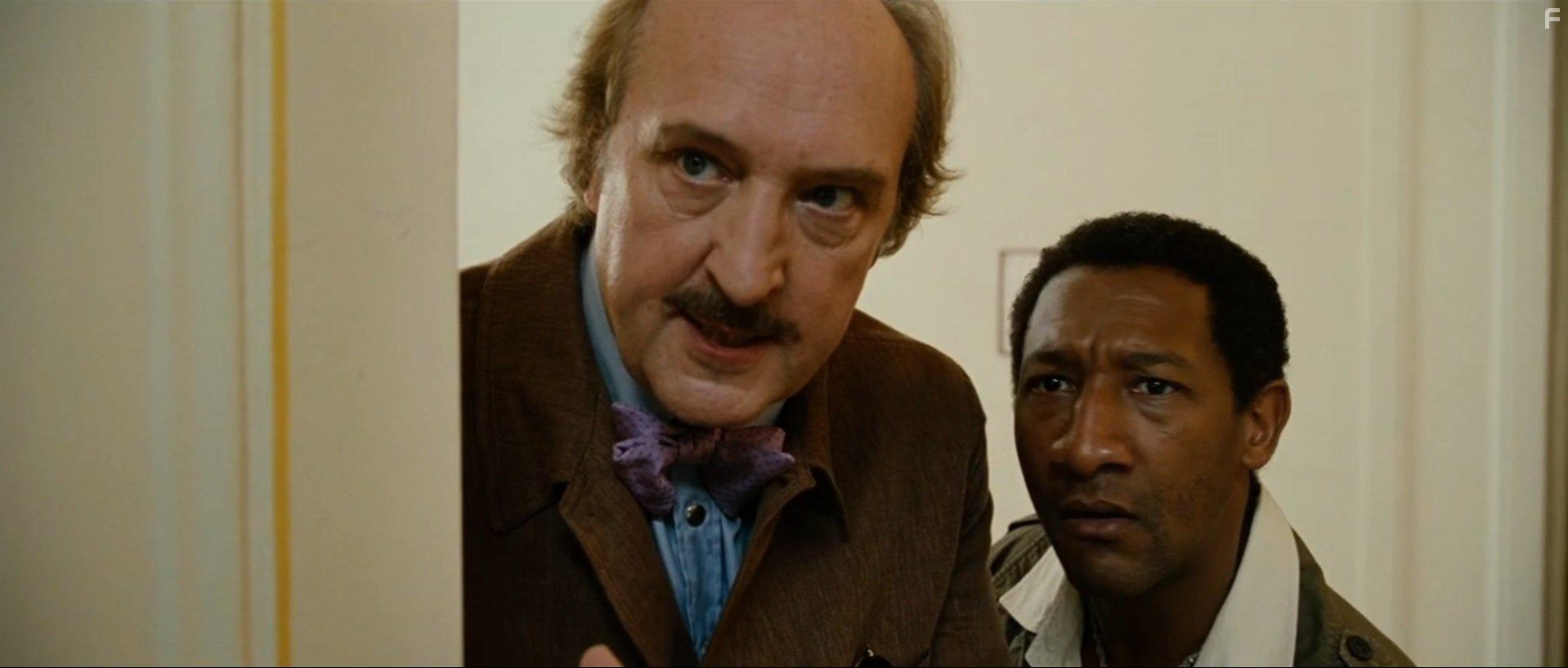 Bernard Farcy and Edouard Montoute in Taxi 4 (2007)