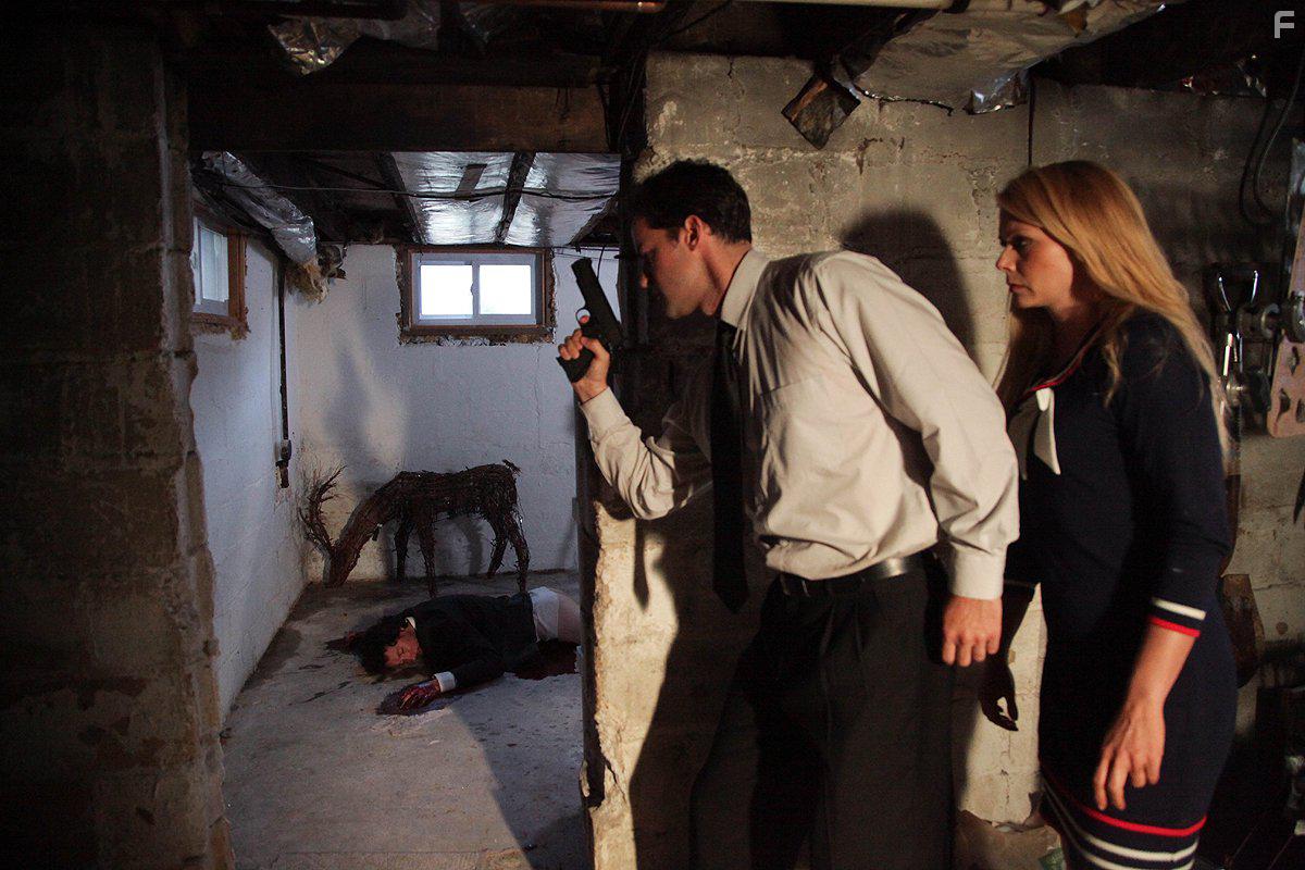 Michael Hogan, David Christopher Wells, and Liv Rooth in Hank Boyd Is Dead (2015)