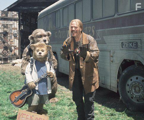 Beary (foreground, left) finds new friends in the Bears' manager, Henry (background left), and Roadie (M.C. Gainey, right).