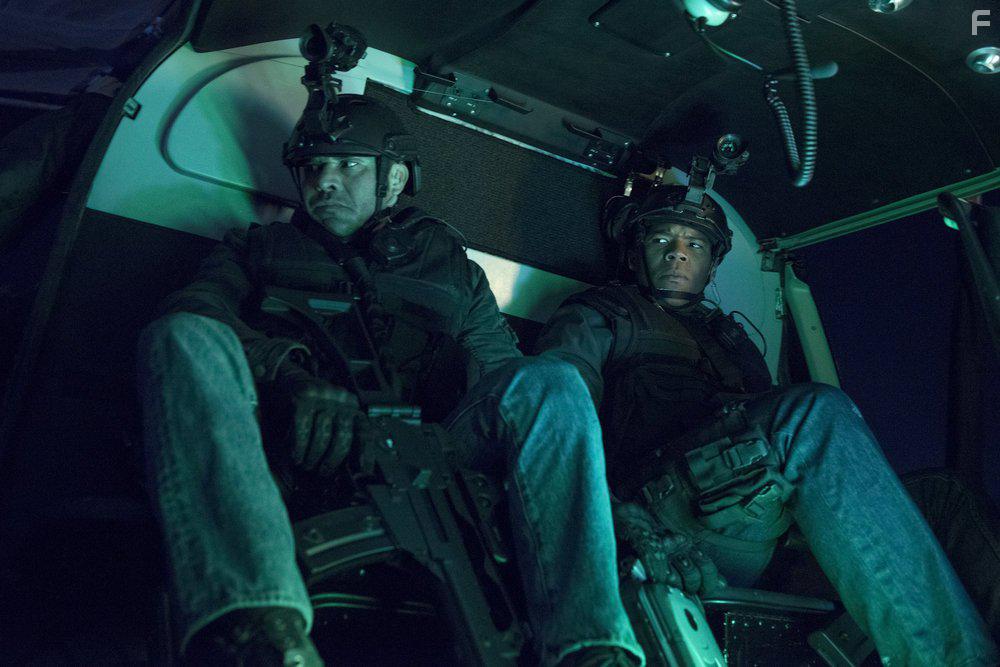 Michael Irby and Gaius Charles in Taken (2016)