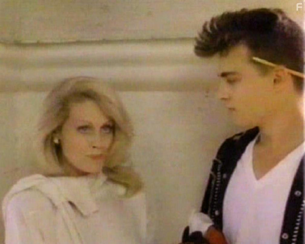 Johnny Depp and Beverly D'Angelo in Slow Burn (1986)