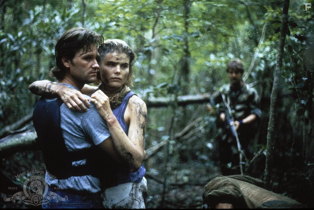 Mariel Hemingway and Kurt Russell in Скверный сезон (1985)