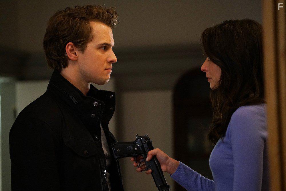 Genesis Rodriguez and Freddie Stroma in Time After Time (2017)