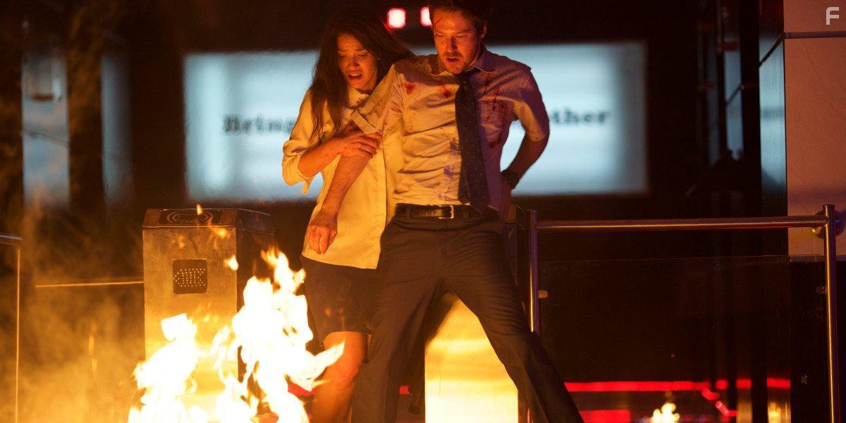 John Gallagher Jr. and Adria Arjona in The Belko Experiment (2016)