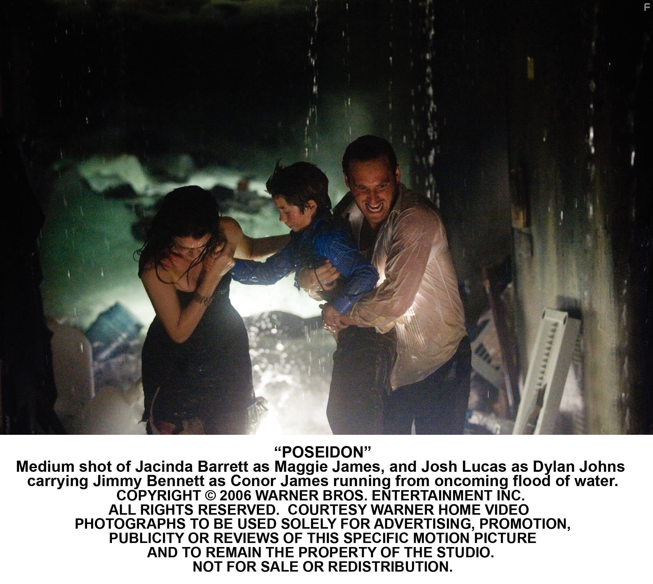 Jacinda Barrett, Josh Lucas, and Jimmy Bennett in Посейдон (2006)