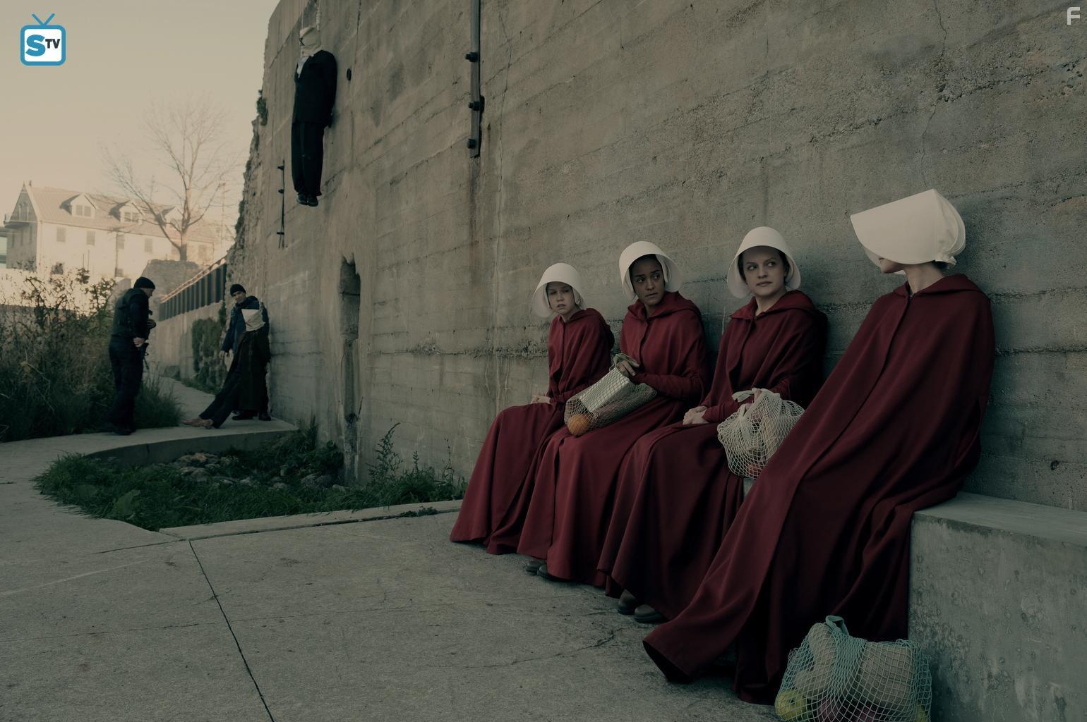 Elisabeth Moss, Alexis Bledel, Jenessa Grant, and Bahia Watson in The Handmaid's Tale (2017)