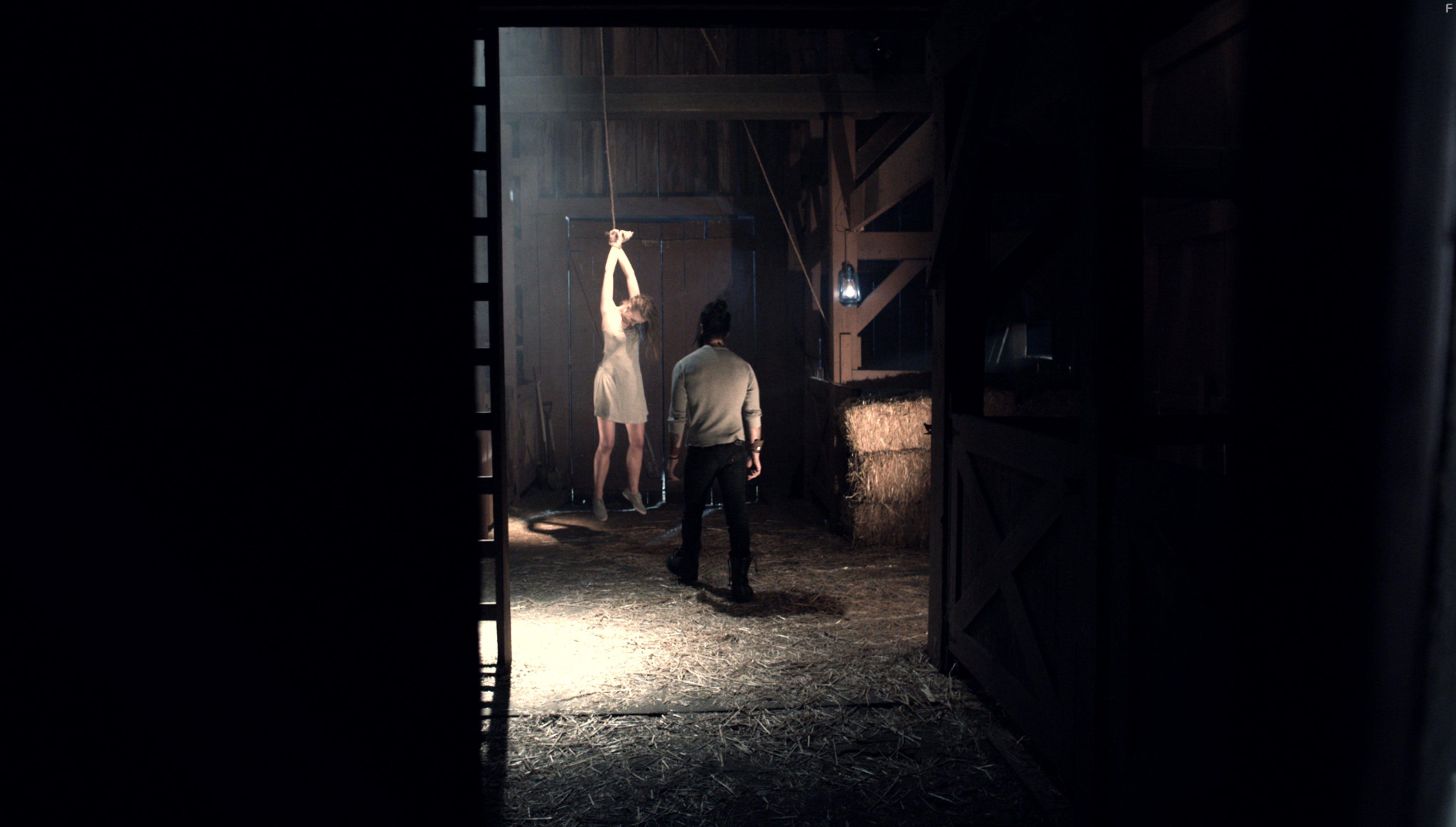 Michael Filipowich and Kate Tumanova in American Exorcism (2017)