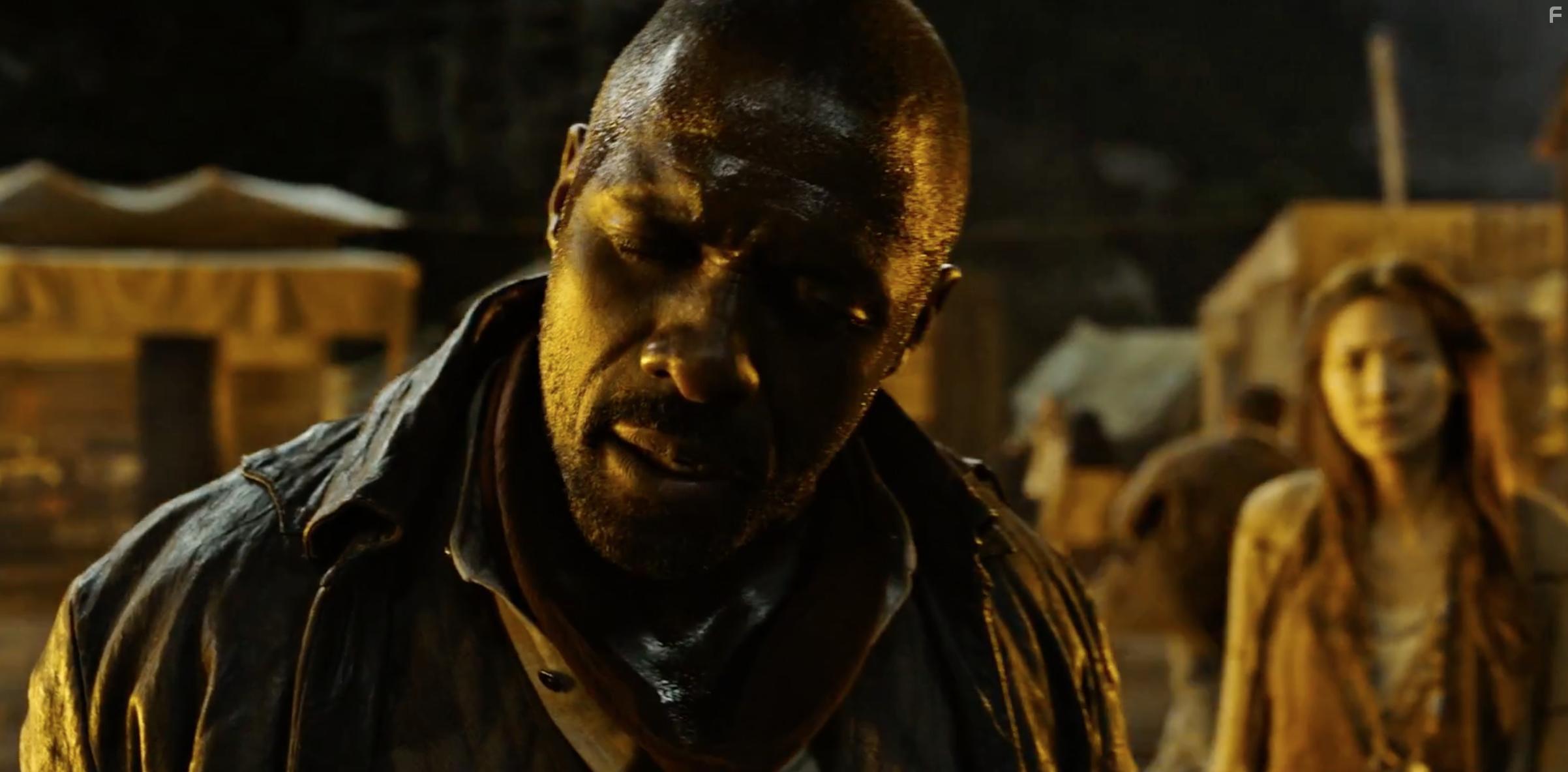 Idris Elba and Claudia Kim in The Dark Tower (2017)