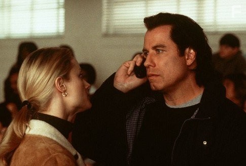John Travolta and Teri Polo in Скрытая угроза (2001)