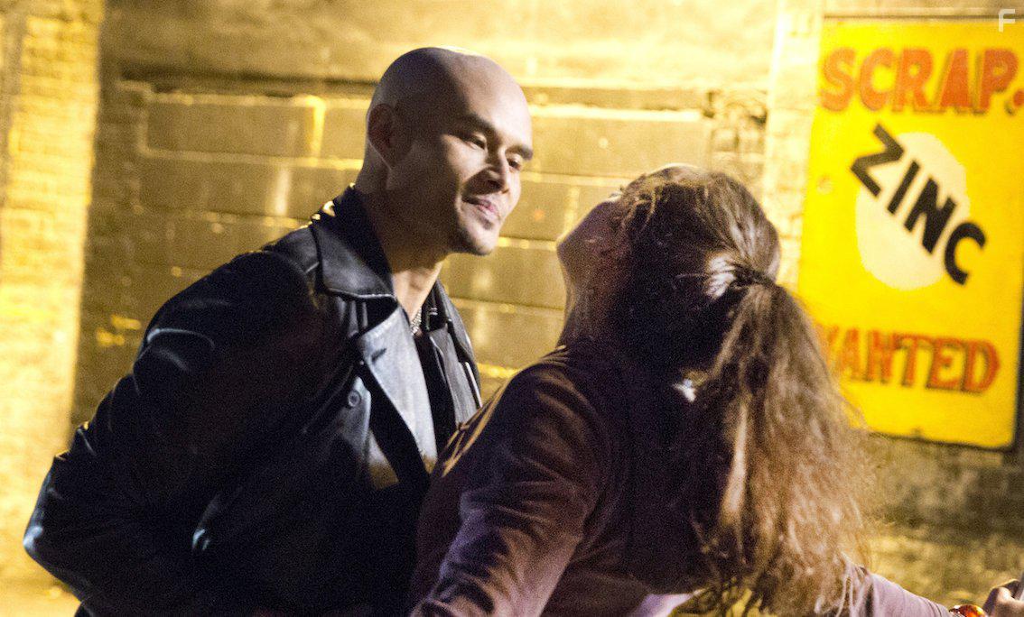 Khan Bonfils as JK and Iulia Benze as Nina in Razors