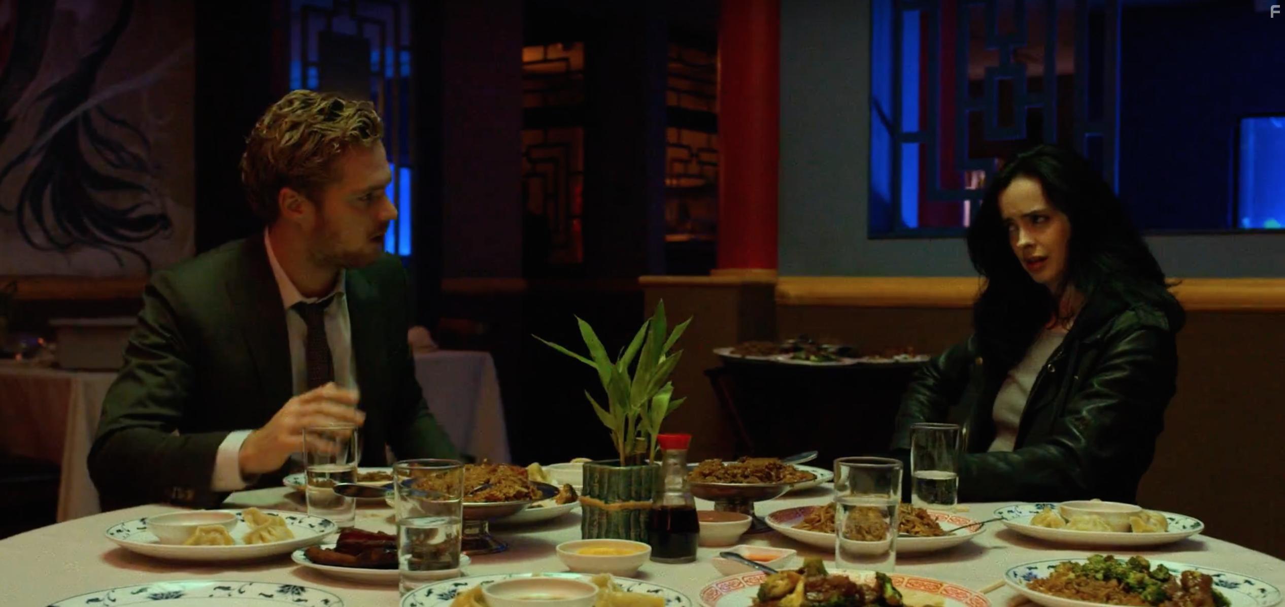 Krysten Ritter and Finn Jones in The Defenders (2017)