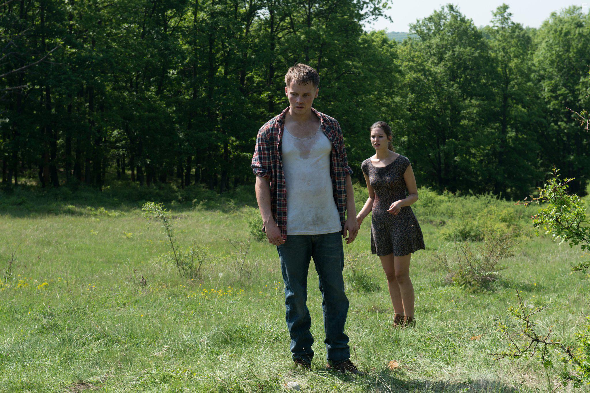Sam Strike and Vanessa Grasse in Leatherface (2017)